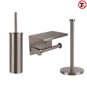 De Tygo Gunmetal WC Set (no-drill) van yessential.nl bestaat uit een roestvrijstalen toiletborstelhouder, een wandcloset met planchet en een vrijstaande toiletpapierhouder - elk in strak gunmetal. "Niet boren" symbool rechtsboven.
