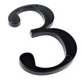 De Matteo Black 10cm van yessential.nl is een zwart, 3D metalen huisnummer 3 met twee schroefgaten voor bevestiging, weergegeven op een witte achtergrond.