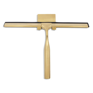 De Zamoro Gold van yessential.nl is een goudkleurige roestvrijstalen douche trekker met een zwart rubberen lemmet, weergegeven op een witte achtergrond.