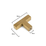 De Vigio Gold Knob van yessential.nl is een T-vormige kast- of ladeknop van 50mm breed, 35mm hoog en 12mm dik. Hij is vormgegeven als een moderne meubelknop en afgebeeld op een witte achtergrond met duidelijke maatlabels.