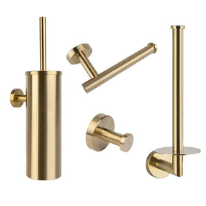 De Cosimo Gold WC set van yessential.nl is een moderne, minimalistische badkameraccessoiresset met vier goudkleurige items: toiletborstelhouder, toiletrolhouder, enkele wandhaak en reserve toiletrolhouder tegen een witte achtergrond.