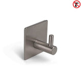 De Tapio Gunmetal WC Set (no-drill) van yessential.nl heeft een cilindrische muurhaak met vierkante basis voor eenvoudige zelfklevende bevestiging - gemarkeerd door een no-drill icoontje - ideaal voor je wc-accessoires of toiletaccessoireset.