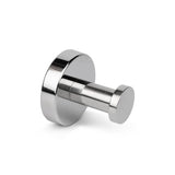 De Mano Chroom WC-set van yessential.nl heeft een metalen wandhaak met een ronde basis en een gepolijste zilveren afwerking, perfect voor elk toilet of badkameraccessoireset. Afgebeeld geïsoleerd op een witte achtergrond.