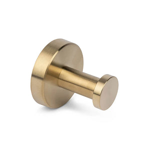 De Kyano Gold Hook van yessential.nl is een ronde haak van geborsteld messing voor aan de muur met een cilindrische pin en ronde basis - perfect om elegant handdoeken of jassen aan op te hangen in de badkamer.