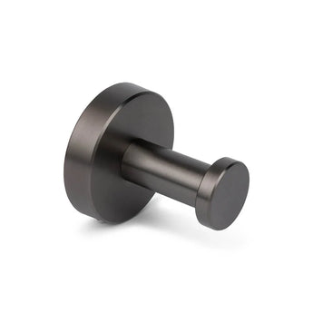 De Midao Gunmetal WC-set van yessential.nl heeft een matzwarte metalen wandhaak met ronde voet en cilindrische knijper - perfect voor handdoeken of jassen in een moderne badkamer of als onderdeel van een luxe WC-accessoireset.