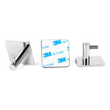 Drie metalen wandhaken uit de yessential.nl Ludo Chroom WC Set (no-drill) zijn afgebeeld: een platte, een onthullende 3M PE-schuim achterkant voor eenvoudig ophangen zonder boren, en een rechtopstaande. Ze hebben allemaal een vierkante chromen basis op een witte achtergrond.