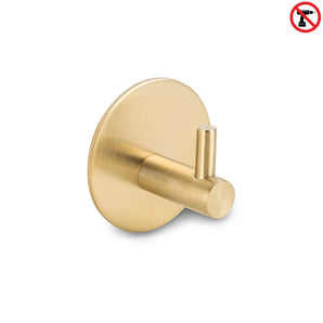 De Rudro Gold van yessential.nl is een gouden cilindervormige handdoekhaak met een ronde basis. Een no-drill icoon geeft aan dat het een handdoekhaak zonder boren is, waardoor installatie eenvoudig is - boren is niet nodig.