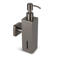 De Sonego Gunmetal van yessential.nl is een modern, minimalistisch RVS zeeppompje met muurbevestiging en vierkante basis. Het verticale venster toont direct het zeepniveau.