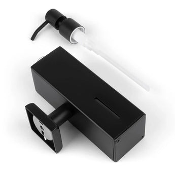 De Sonego Black zeepdispenser van yessential.nl, een strak zwart rechthoekig ontwerp met een aparte pomp en een gleuf voor het controleren van het zeepniveau, combineert moderne stijl en functie. Afgebeeld op een witte achtergrond.