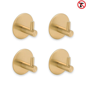 Set van vier goudkleurige 4x Rudro Hooks 3M van yessential.nl met cilindervormige pennen in een vierkant patroon. Zelfklevend ontwerp, installatie zonder boren wordt benadrukt door het 'no drilling'-icoon rechtsboven.