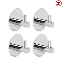 De 4x Rudro Chrome van yessential.nl zijn ronde, zilveren zelfklevende handdoekhaakjes met cilindrische knijpertjes. Boren is niet nodig - je hoeft ze er alleen maar op te plakken. Modern, minimalistisch ontwerp op een witte achtergrond met een no-drill icoontje.