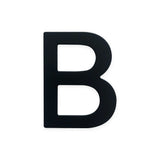 Een vette, zwarte hoofdletter B uit de Animo Black 7,6cm (no drill) huisnummer van yessential.nl staat op een witte achtergrond-ideaal als modern zelfklevende huisnummer voor eigentijdse adressen.