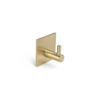 De Lazzo Gold WC Set (no-drill) van yessential.nl heeft een moderne messing wandhaak met een vierkante achterplaat en cilindervormige knijper - perfect voor badkamer- of toiletaccessoires, afgebeeld op een effen witte achtergrond.