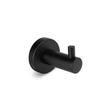 De Armando Black Set van yessential.nl bestaat uit een matzwarte cilindervormige wandhaak met een kleine knijper op een ronde basis - perfect om elke badkameraccessoires-collectie mee uit te breiden.