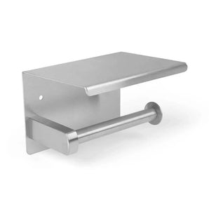 De Tazio RVS toiletrolhouder van yessential.nl is een wandgemonteerde, roestvrijstalen houder met een plat schap voor kleine spullen, en biedt een moderne, minimalistische stijl en functionele opslag voor elke badkamer.