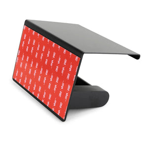 De Tazio Black (No Drill) van yessential.nl is een zwarte autovizierclip met een rood 3M VHB kleefpad voor eenvoudige bevestiging zonder boren, afgebeeld schuin op een witte achtergrond als een toiletrolhouder zelfklevend.