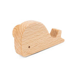 Bambino Willy van yessential.nl is een kleine, gladde, lichtgekleurde houten knop in de vorm van een walvis met eenvoudige uitgesneden details en zichtbare houtnerf - perfect als meubelknop in de kinderkamer.