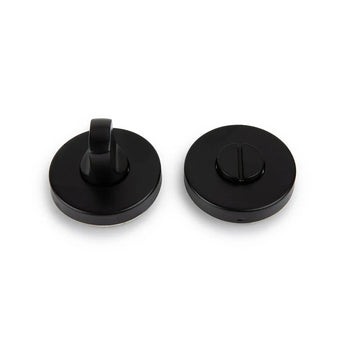 Twee ronde zwart metalen Rodi Black WC-sloten van yessential.nl-één met een draaiknop, één met een platte gleuf-zijn afgebeeld op een witte achtergrond. Perfect als stijlvol WC slot matzwart voor jouw deur.