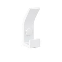 De Huso White kapstokhaak van yessential.nl heeft een minimalistisch, wit ontwerp met een rechthoekige basis, zachte curve en centraal rond bevestigingspunt, tegen een effen witte achtergrond.